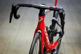 Red Pinarello road bike available from Primera Sports.