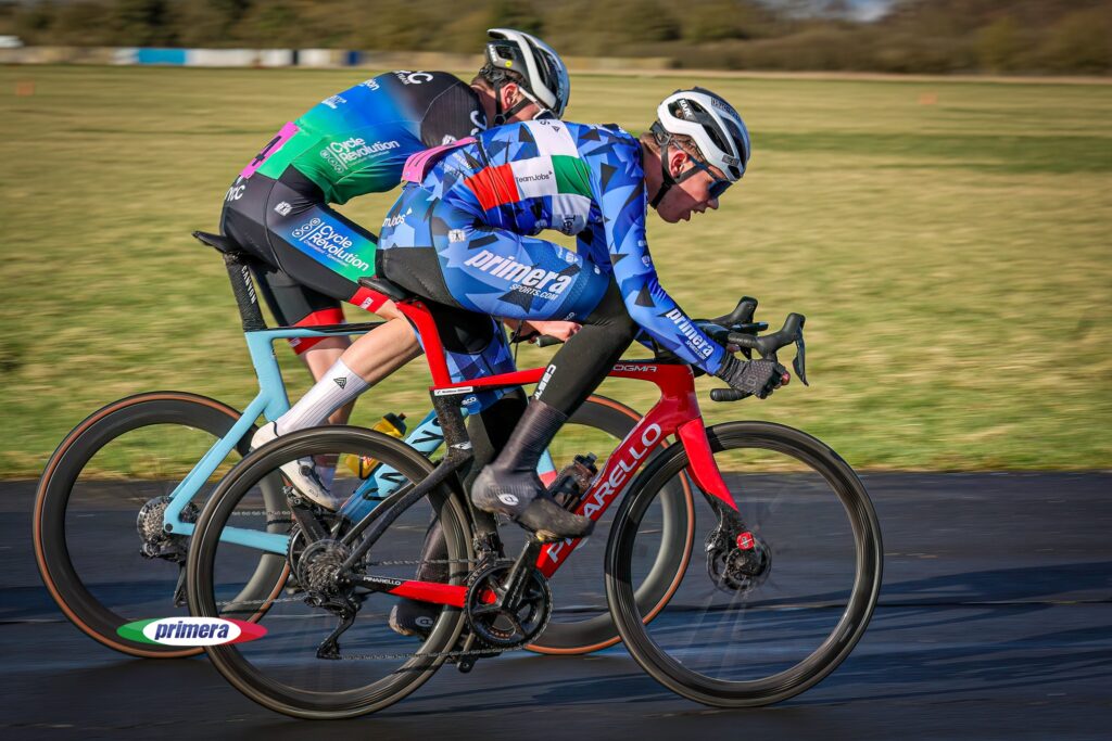 Primera sports rider using red pinarello dogma f during cycling race